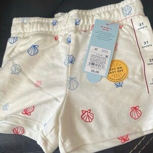 White Shorts with Red and Blue Shell Print